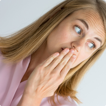 Cover on teeth with hand