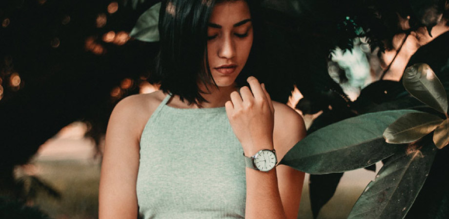 dark haired girl looking pensive with anxiety